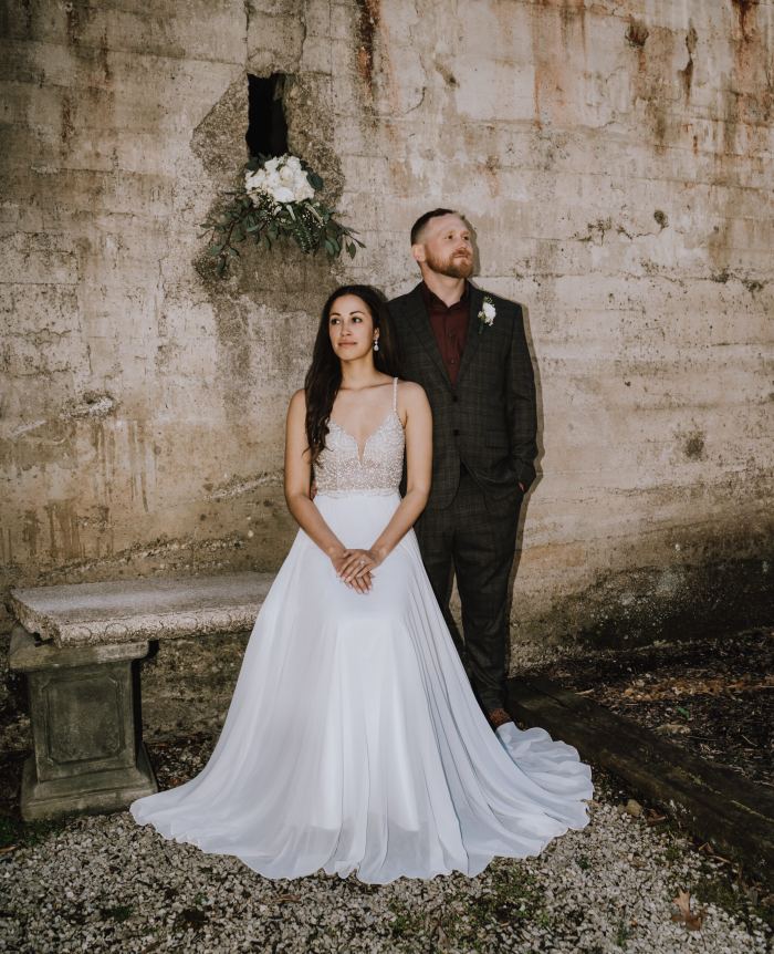 Bride and groom at a rustic stone venue near Nashville