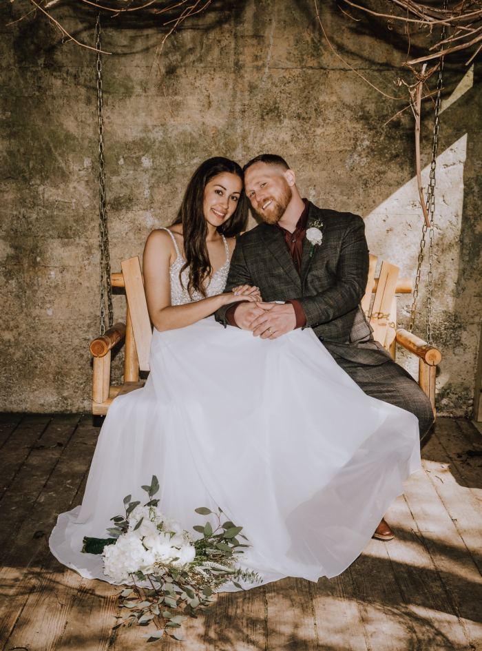 Newlyweds at a rustic industrial venue in Nashville